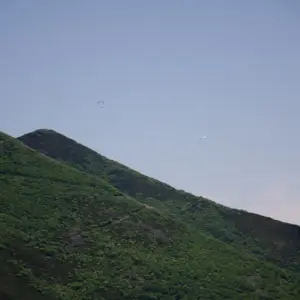 Paragliders flying from Annupuri.