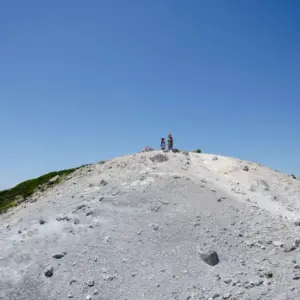 The summit area is covered with slippery volcanic ash.